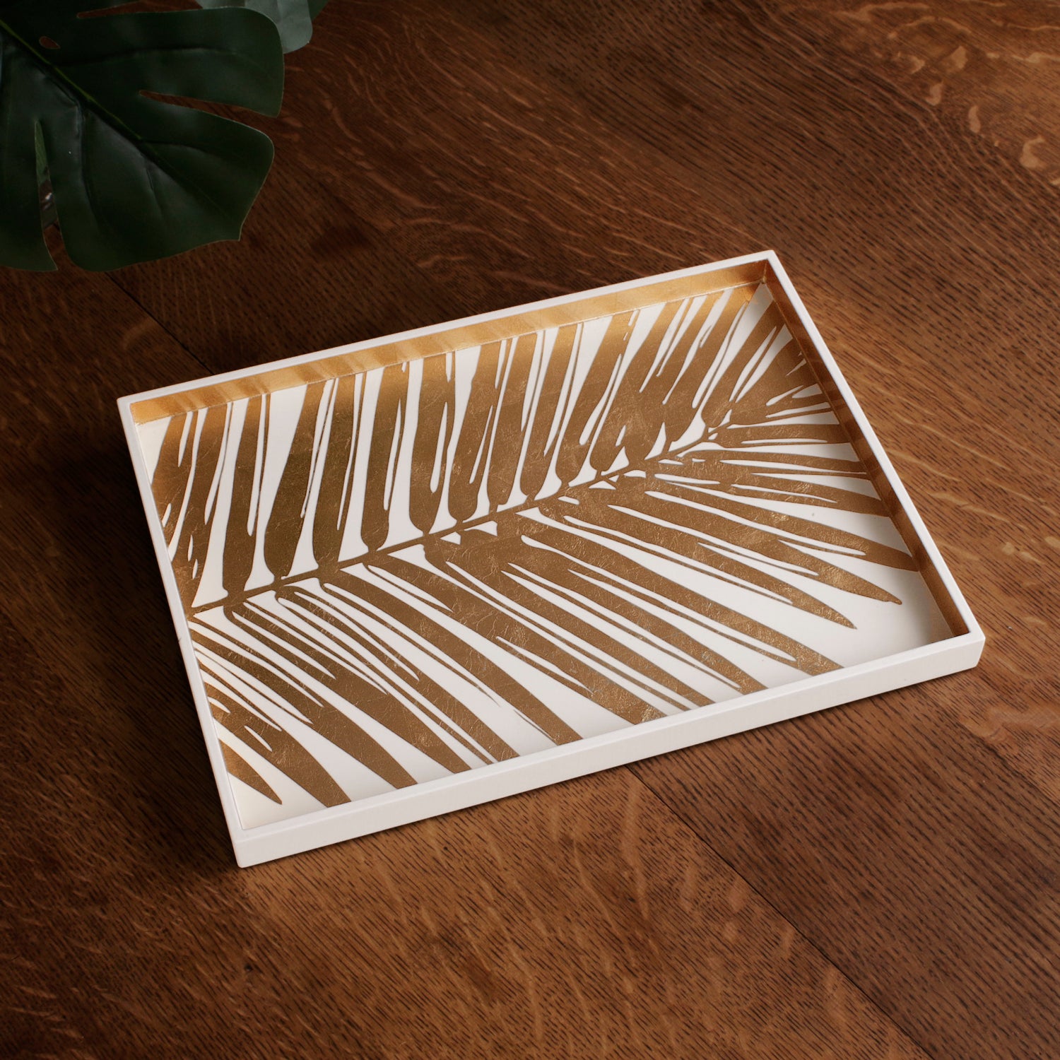 3240_ca5d7118-94b9-4de5-8b28-7f52597fdc19 NDOCHINE Small Lacquered Palm Tray White and Gold - Image 1